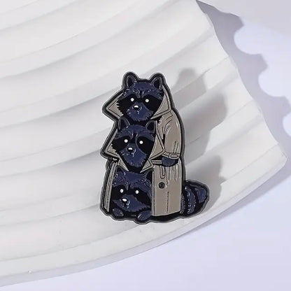 Three Raccoons In A Trenchcoat Enamel Pin