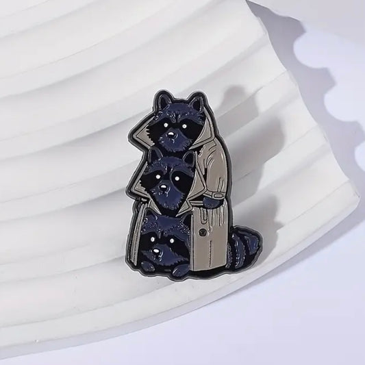 Three Raccoons In A Trenchcoat Enamel Pin
